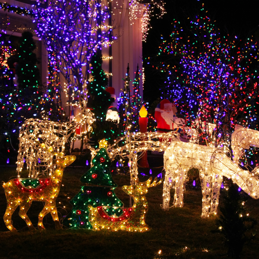 many xmas lights scene with animals and trees in many colors